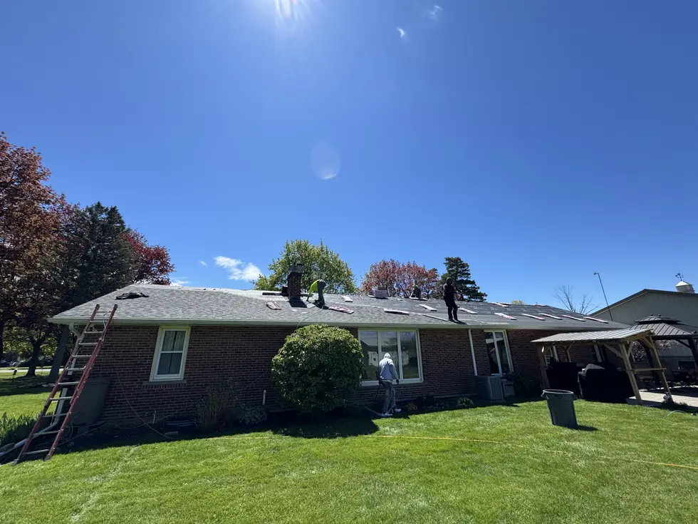 The TNE Roofing crew working on a Western New York ranch home roof replacement