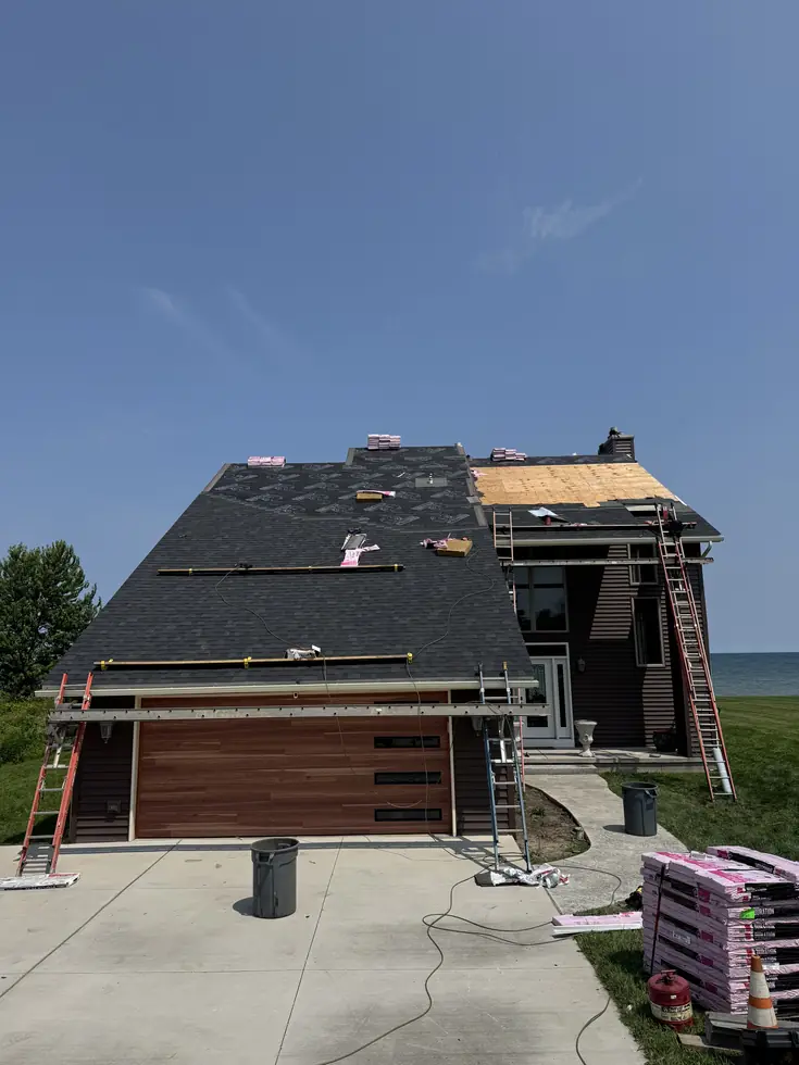 Replacement decking and underlayment going down during a roof replacement — a real cost driver