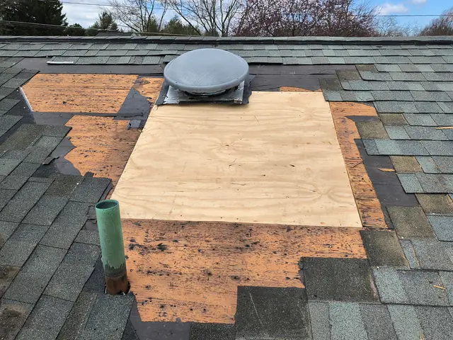 Rotted roof decking replaced with new plywood sheathing before shingles go on
