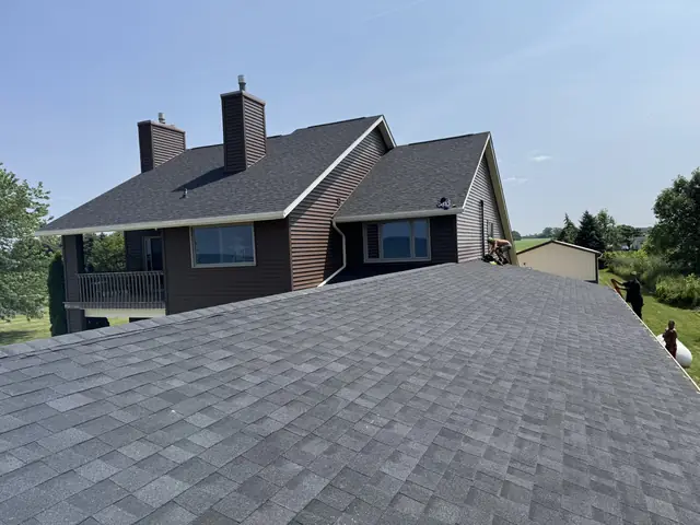Completed architectural shingle roof across a wide plane on a Western New York property