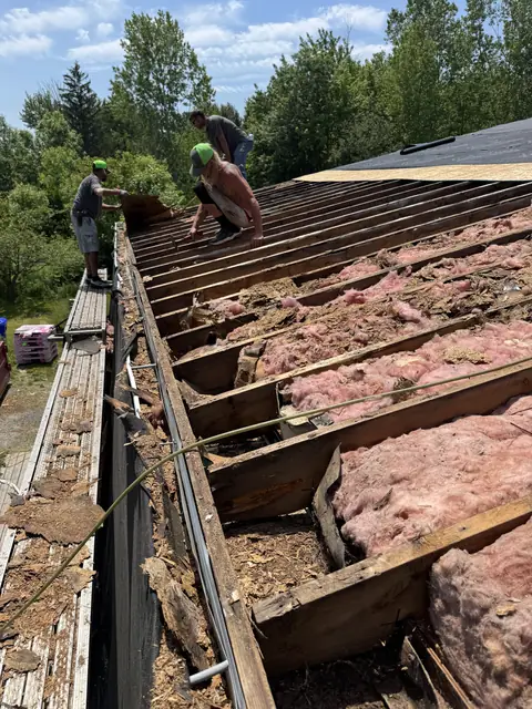 Roof stripped to the rafters during a full replacement, decking removed