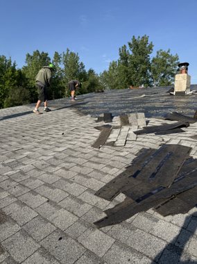 Roof tear-off in progress &mdash; TNE Roofing & Siding